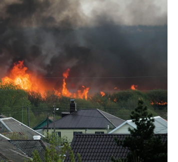 wildfire near houses
