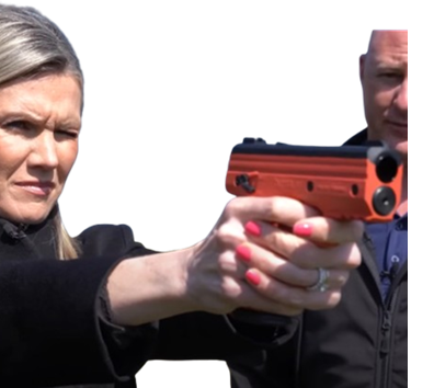 woman firing byrna sd